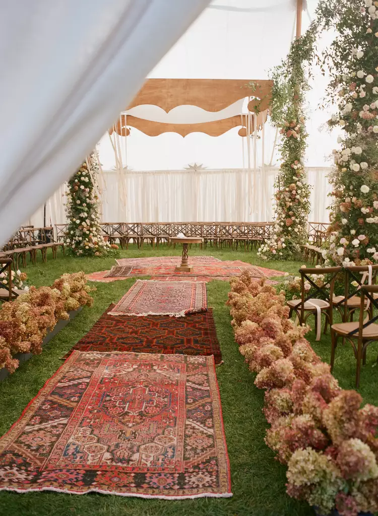 fall-wedding-decorations-tented-ceremony-rugs-dried-hydrangeas-kate-headley-0623
