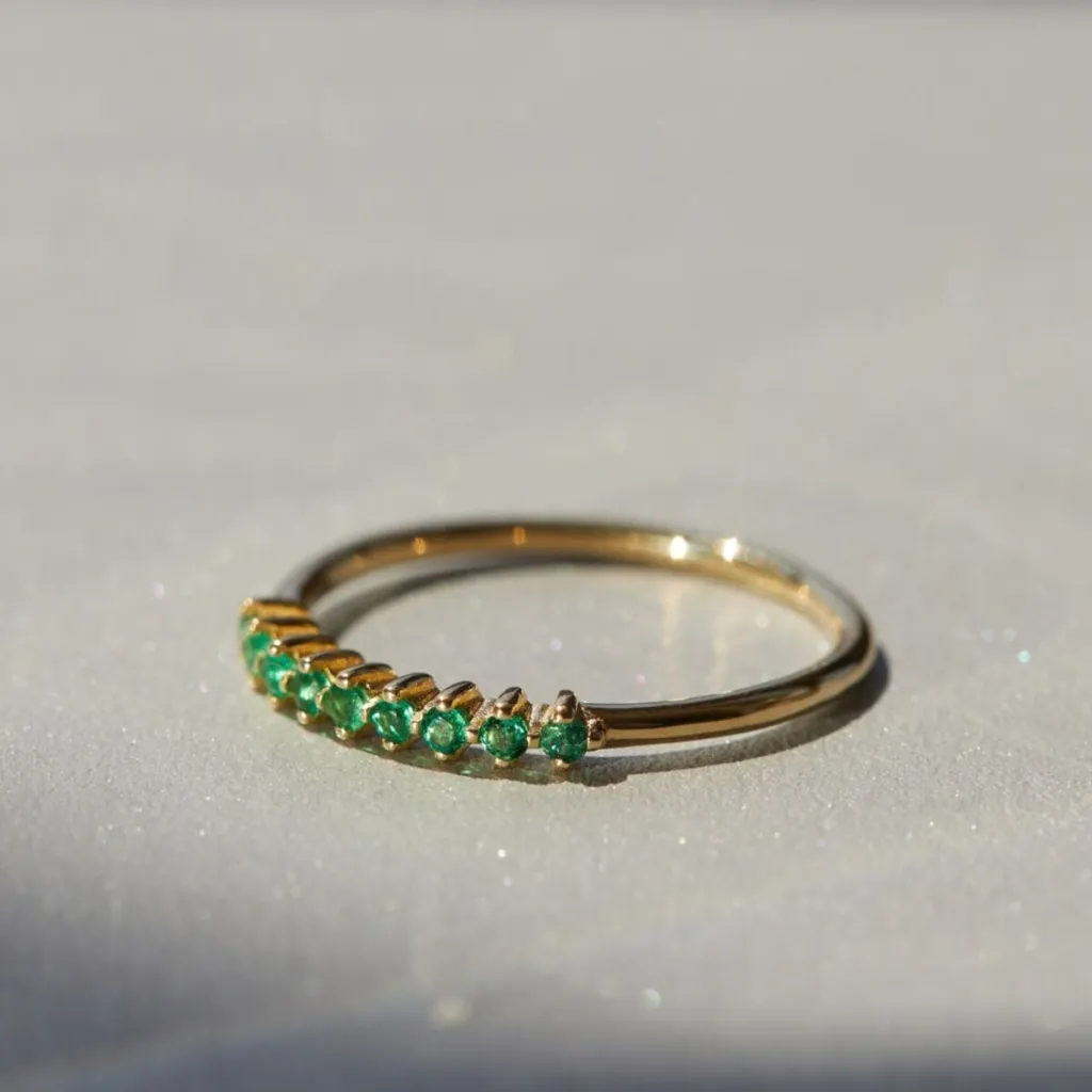 dainty-emerald-dotted-gold-engagement-ring