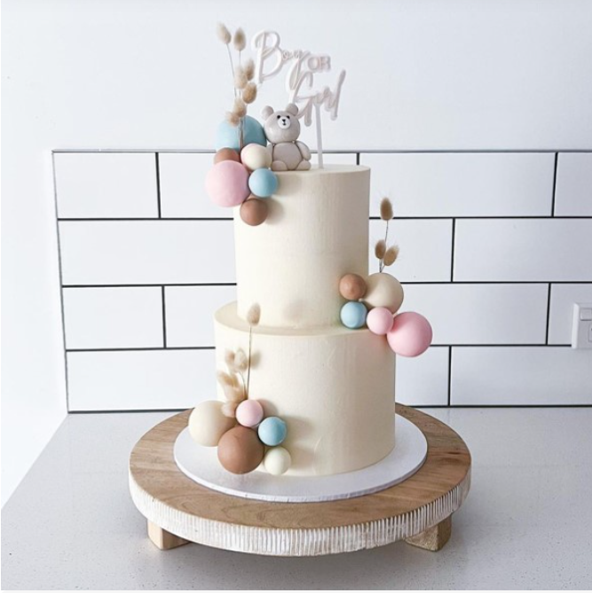 Gender reveal cakes with a boho vibe
