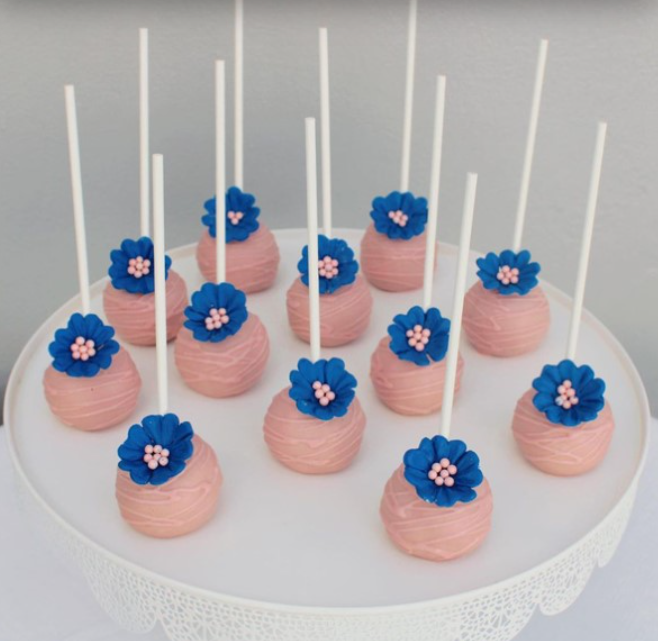 Gender reveal cake pops with flowers
