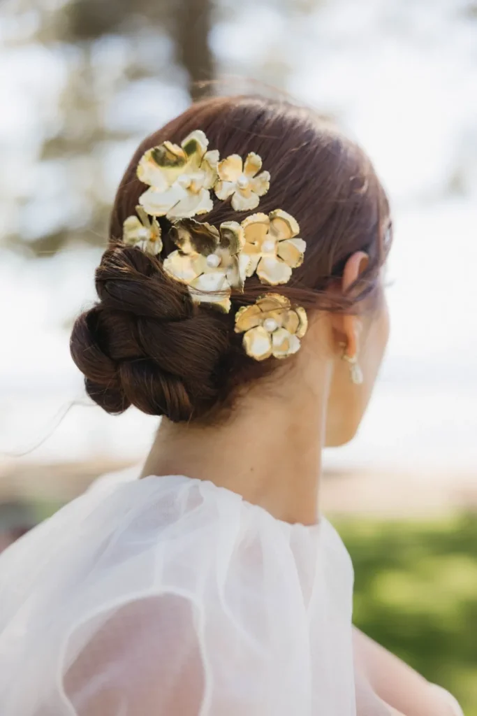 elegant-braided-low-bun-best-easy-simple-wedding-hair-with-flower-pins