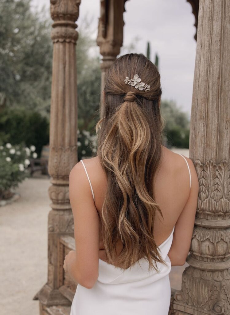 elegant-hair-down-wedding-hair-inspo-with-knotted-ponytail-and-boho-hairpiece