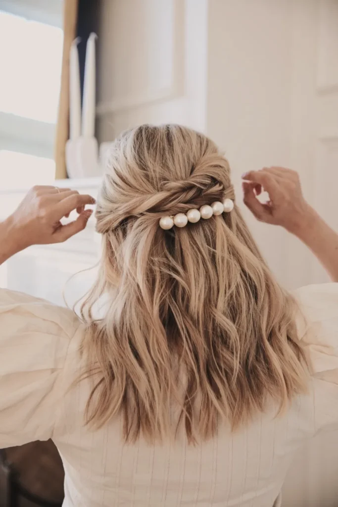 elegant-twisted-wavy-hair-down-best-easy-simple-wedding-hairstyles-with-pearl-barrette